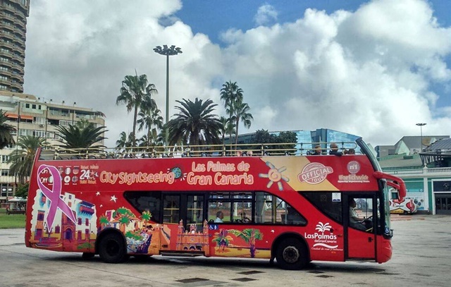Guagua turística - Día Mundial del Cáncer